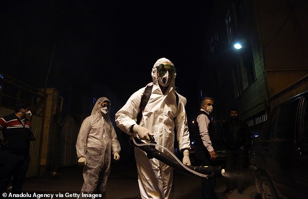 25831768-8099925-image-a-22_1583928949581 Disinfection works are being carried out by fire brigade crew in the streets of Tehran as a precaution against coronavirus (COVID-19) today