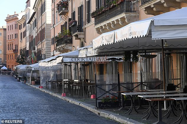 25875816-8109893-closed_bars_and_restaurants_near_piazza_navona_in_rome_yesterday-a-112_1584121346670 Closed bars and restaurants near Piazza Navona in Rome yesterday after Italy's quarantine was tightened even further