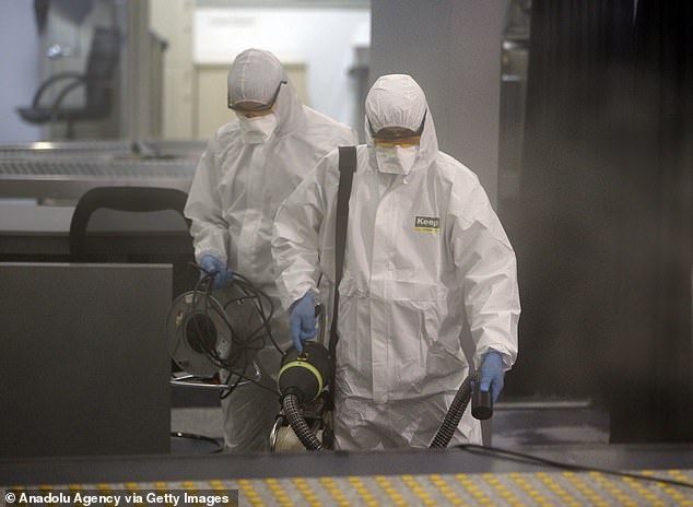 25891392-8105339-image-m-33_1584027074236 Occupancy rates at Spanish hotels have fallen dramatically, with some hotels left empty due to the COVID-19 epidemic, a top official at Spain's hotels and tourist accommodations federation CEHAT said on Thursday (Pictured: Disinfection work is carried out in Ankara, Turkey)