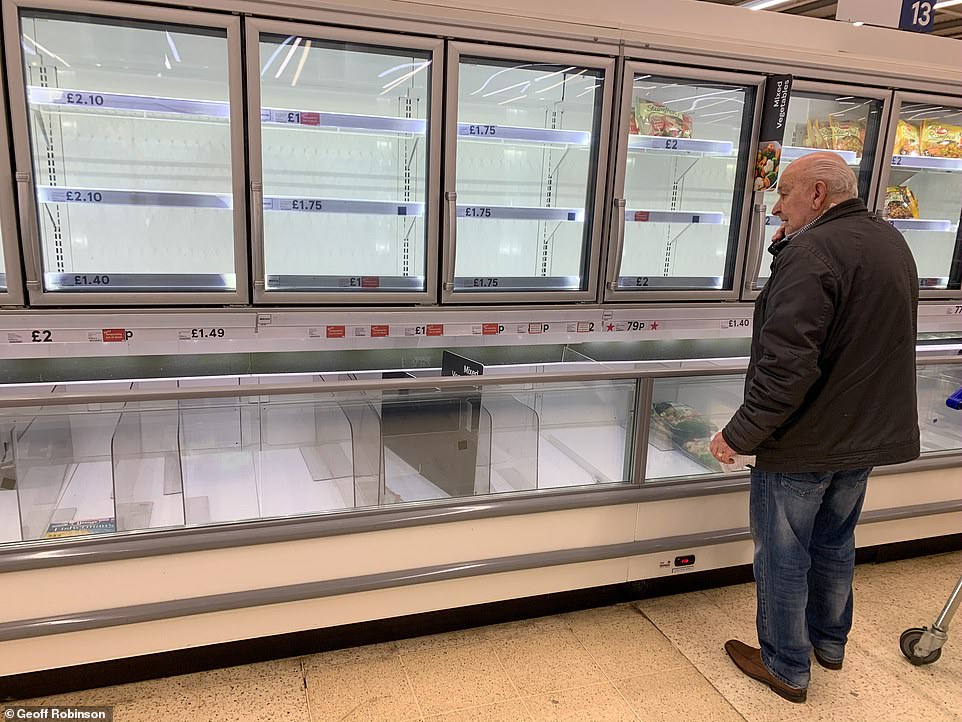 26211086-8134241-image-a-4_1584717646841 Shoppers were faced with empty shelves in Tesco, Cambridge, on Friday morning when supplies were cleared before they had a chance to buy during their 'Pensioners' Hour'