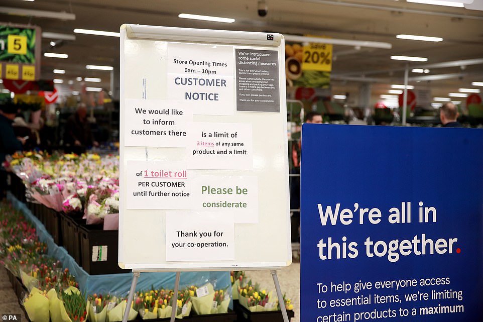 26236144-8137409-image-a-47_1584787132286 A sign for customers on entering Tescos in Aldershot telling them there is a limit of three items of any same product and a limit of one toilet roll per customer