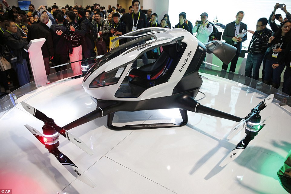 EHang is building the world's first 'Autonomous Aerial Vehicle' for transporting people. The company has permission to test the Ehang 184 in Nevada. The rider punches in a destination on a touch screen in front of the passenger seat, then the drone flies there automatically