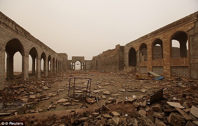 Weeks after overrunning Mosul and much of Iraq's Sunni Arab heartland, ISIS militants rigged the shrine, pictured here, and blew it up, sparking global outrage