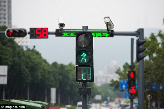 Cameras capture an offender's face and sends it to display screens, as well as the police bureau, where using face-recognition technology is used to identify the person. Cameras 24-hour operatin will capture any jaywalkers' image and display on the monitor
