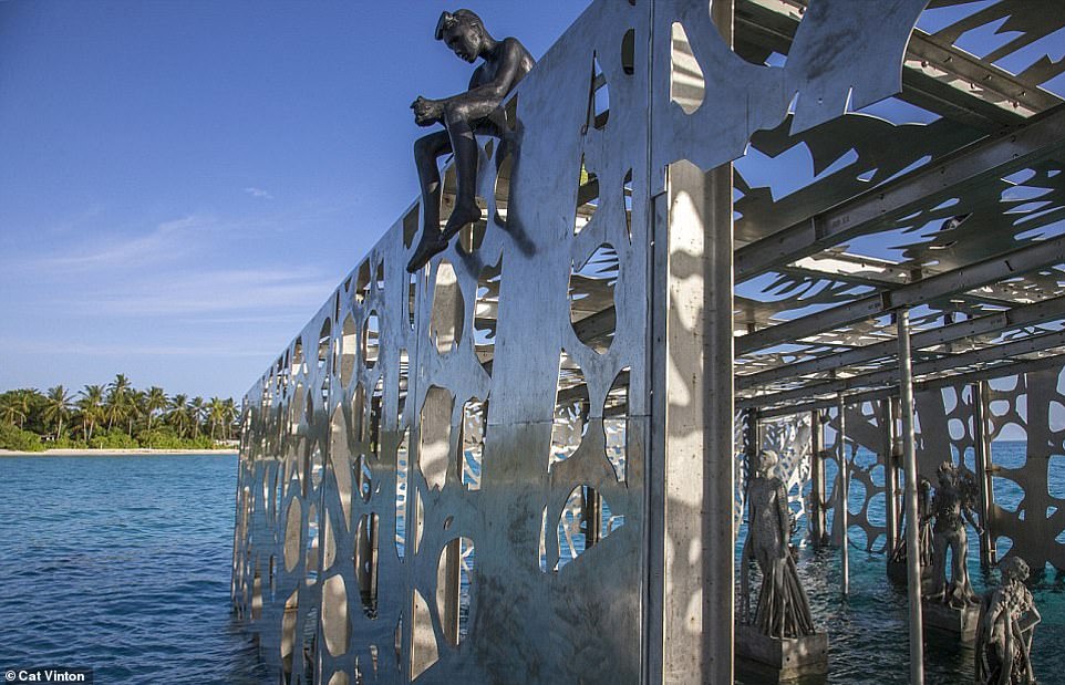 4537378-6205159-image-a-14_1537885327649 The semi-submerged cube, pictured, was known as the Coralarium. It was designed by British artist Jason deCaires Taylor
