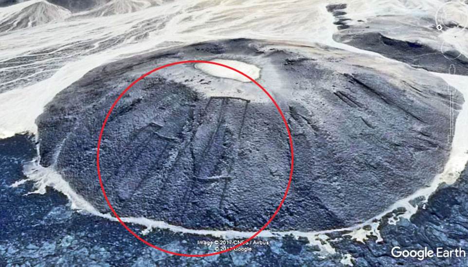 The stone structures- which were found using Google Earth - have been dubbed the 'gates' because they appear to look like field gates from above. There are gates pictured going up the side of this lava dome in the foreground