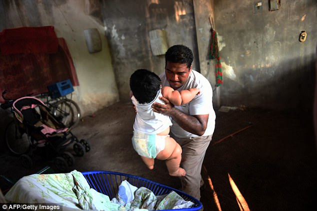 Father Mario said it is becoming difficult to lift or hold his son because of his weight