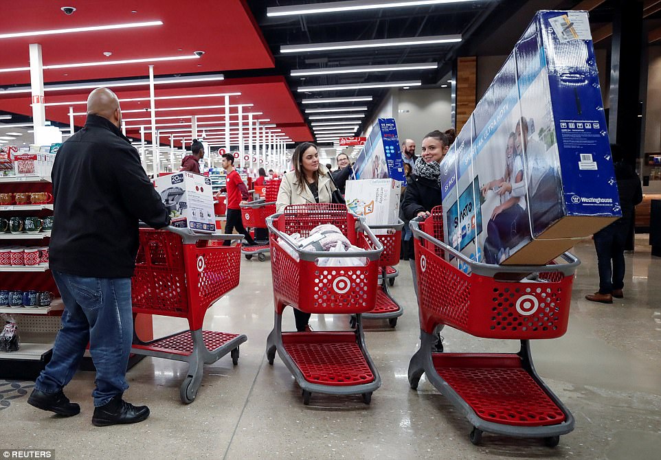 CHICAGO: At this Target in Chicago, two women leave satisfied with TVs and home goods on Thursday night 
