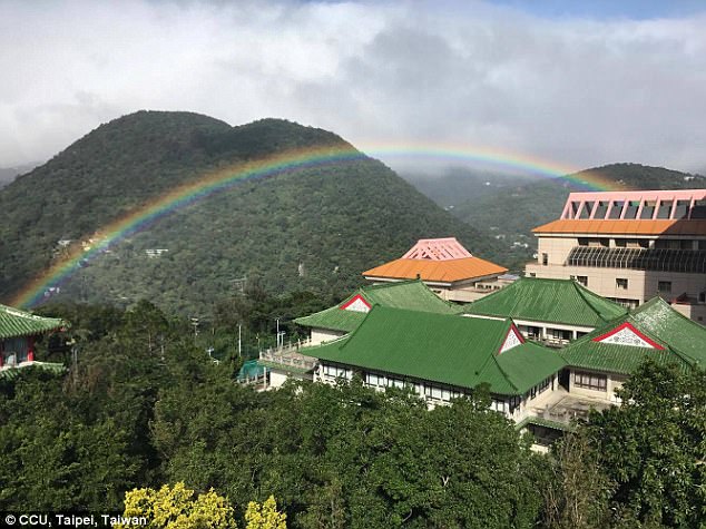 The arc of the rainbow spread across the university campus from 7am to 4pm