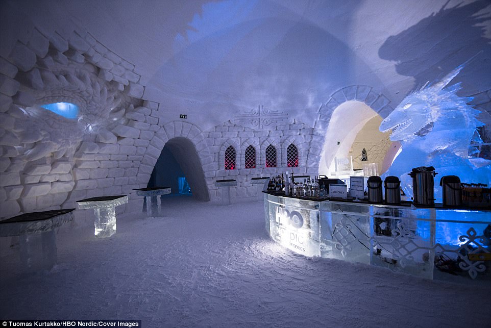 A dragon also guards the ice bar, where customers are served drinks inside carved glasses that are made out of ice 