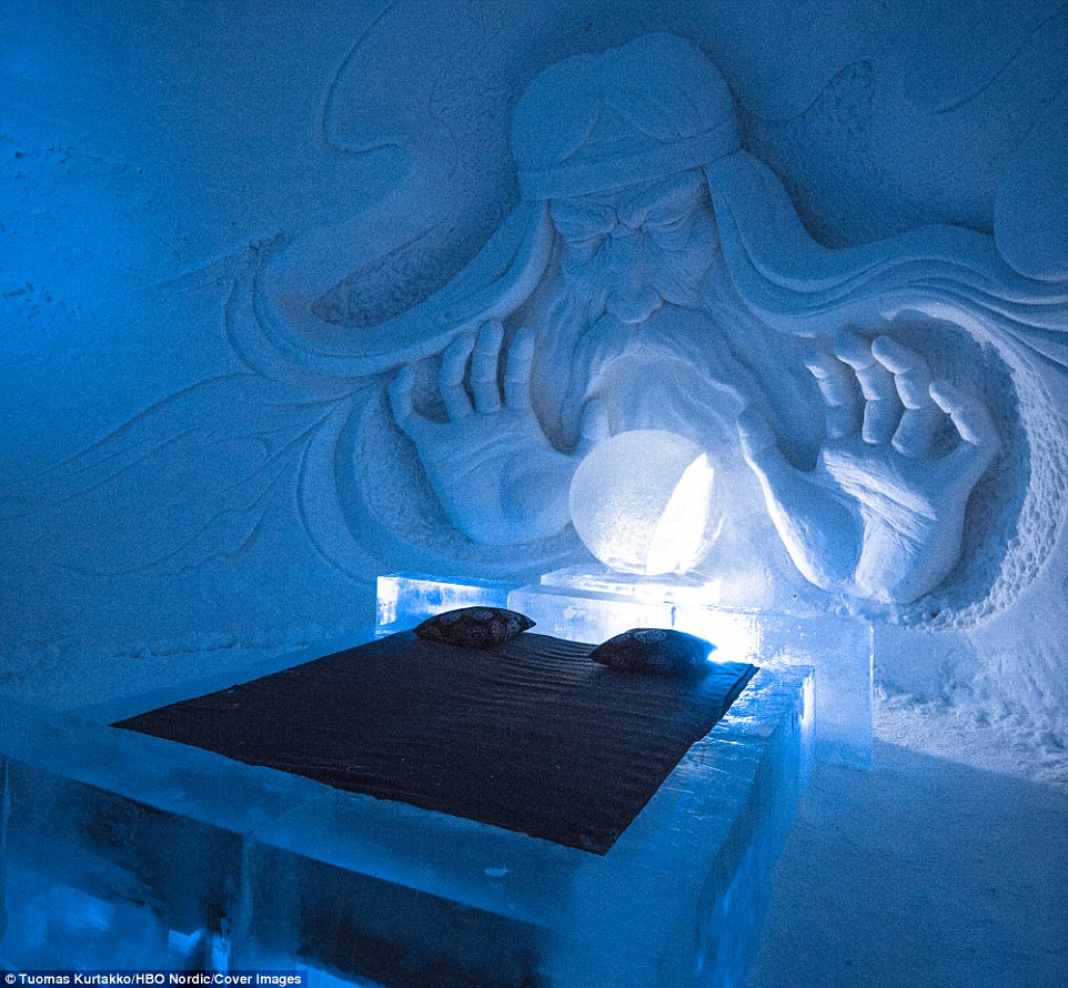 An ice sculpture looms over a double bed in one of the 10 suites available at the Game of Thrones-themed hotel in Lapland 