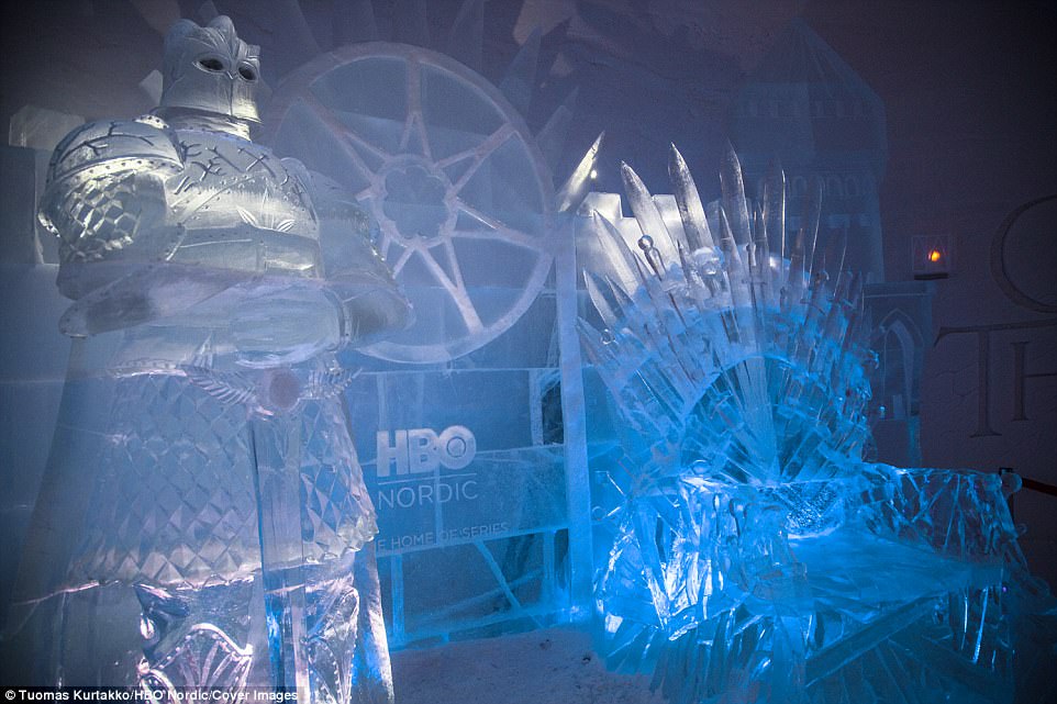 An icy replica of the Iron Throne guarded by the Mountain that Rides inside the Game of Thrones-themed hotel in Lapland