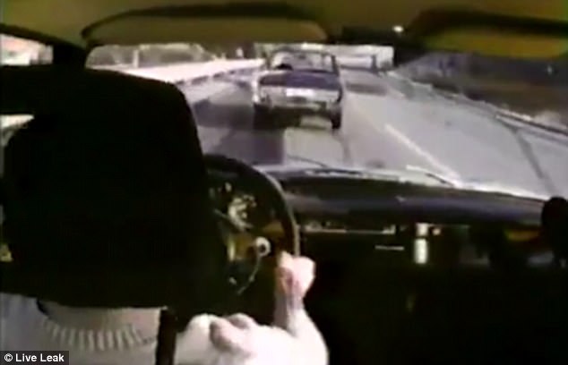  Here, a driver is shown speeding straight behind a stationary vehicle, crashing into it