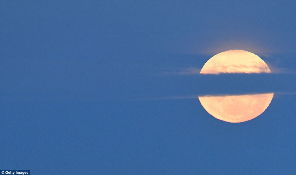 If you live in the Central time zone, viewing will be good, since the action begins when the moon is higher in the western sky. The Earth's shadow is not completely black but has a reddishy hue, which has led many cultures to describe it as a blood moon. Pictured is the moon above Marine Parade Beach in Napier, New Zealand