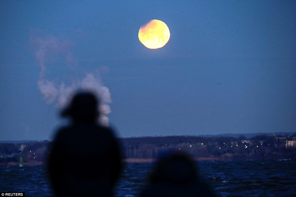 People watch the super blue blood moon over Brooklyn. While people in the eastern Hemisphere saw their last Blue Moon total lunar eclipse in 1982, for the Western Hemisphere, this eclipse will be the first blue moon total eclipse since 1866