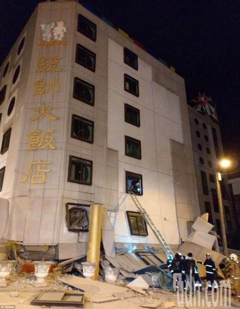 Shaken: Images posted on social media show emergency services carrying out evacuations of the hotel in Taiwan 