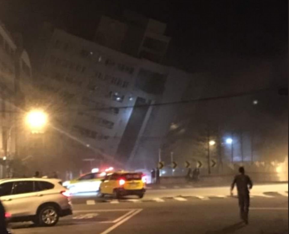 Collapse: The hotel is pictured less than an hour after the earthquake hit the island nation off the coast of China