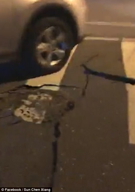 Taiwan's official Central News Agency posted photos showing a road fractured in several parts