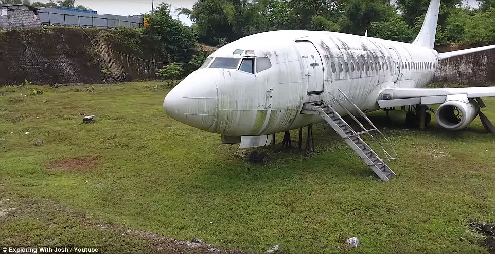 Despite it being behind a locked gate, guarded by security, the plane has become a quirky tourist attraction