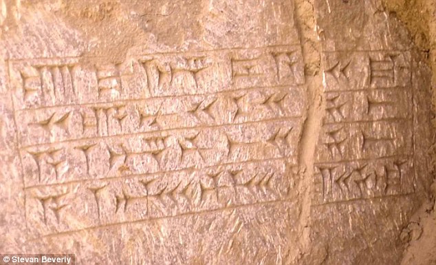 The texts appear similar to the inscription pictured, found in an ancient palace in Nineveh, Iraq. It reads: 'The palace of Ashurbanipal, great king, mighty king, king of the world, king of Assyria, son of Esarhaddon, king of Assyria, descendant of Sennacherib, king of Assyria'