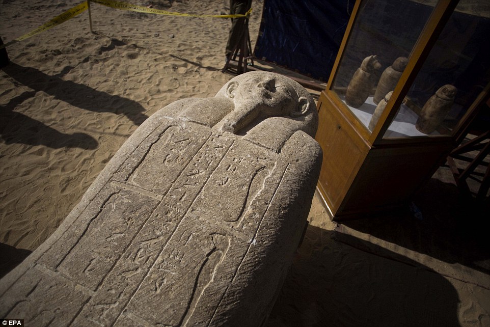 The burial site, which is more than 2,000 years old, was discovered in the city of Minya, south of Cairo, and contained canopic jars and other funerary items 