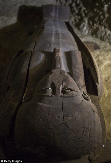 A sarcophagus is seen in the tomb, where archaeologists have been working for months