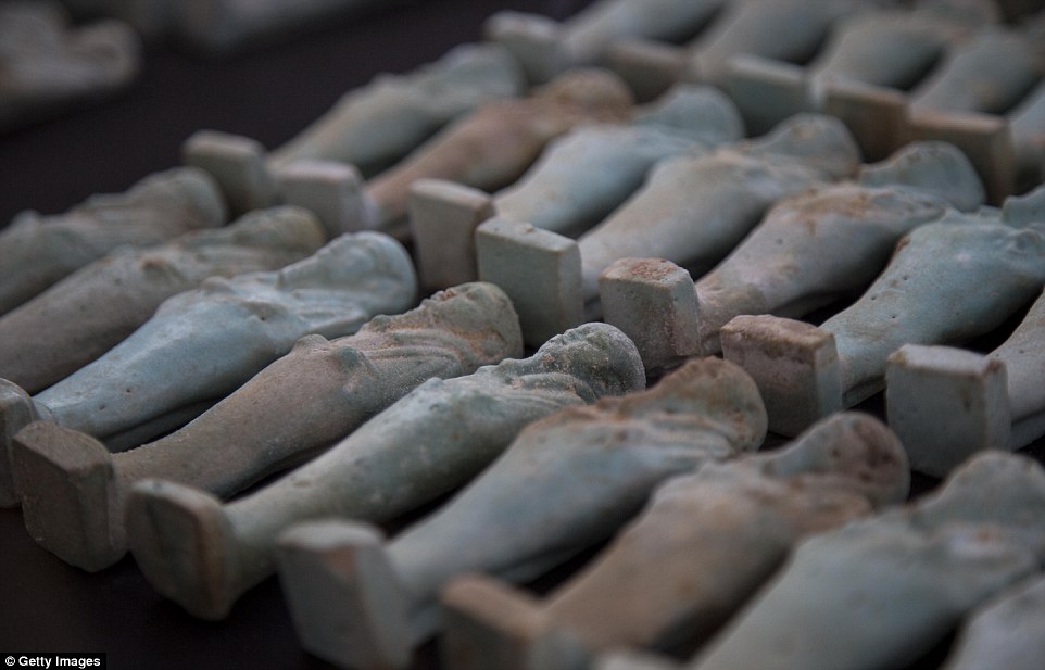 Miniature statues are seen in the cemetery which is believed to be more than 2,000 years old 