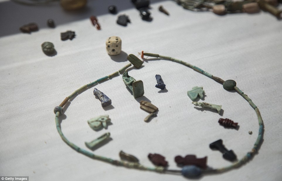 Ancient artefacts are seen in the Egyptian tomb, where excavation work started in late 2017, with archaeologists on a quest to find the remainder of the cemetery of Upper Egypt's 15th nome during ancient times