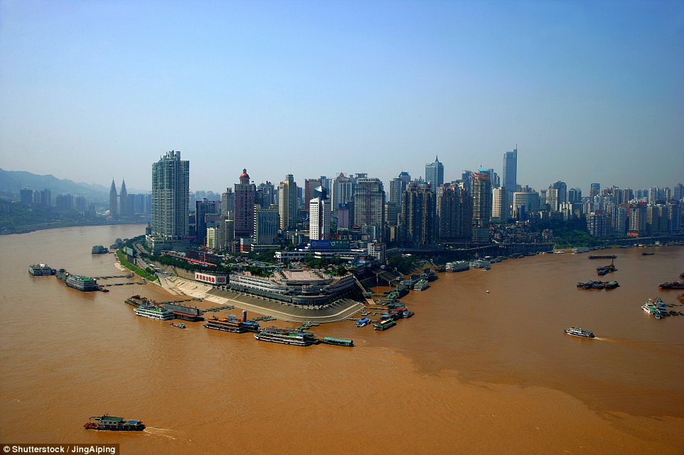 49f95c9e00000578-5469297-image-a-27_1520438846357 The iconic Yangtze River and Jialing River meet at the scenic Chaotianmen area, pictured before the construction started