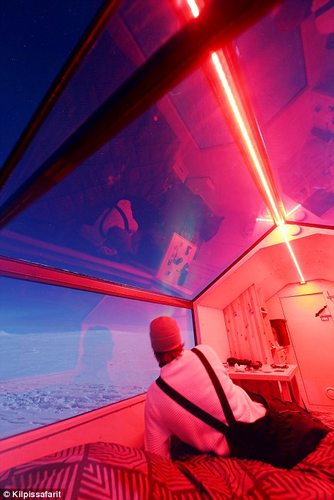 The small abodes also feature clear roofs, so guests can view the Northern lights while laying down