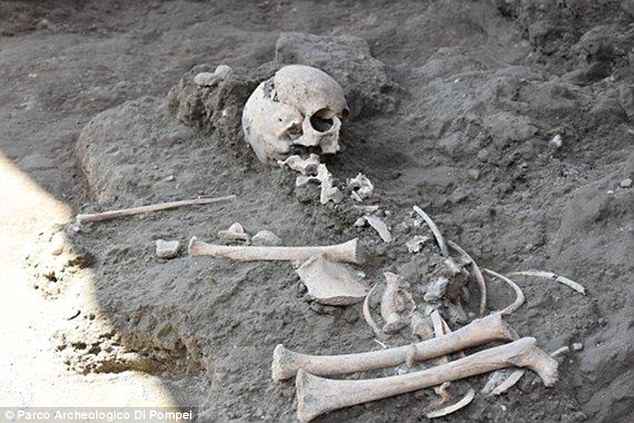The tragic skeleton of a child who perished in the eruption of Mount Vesuvius has been uncovered in the ruins of a public baths complex. Workers restoring the ancient thermal baths in Pompeii discovered the body, believed to belong to a child aged seven or eight at the time