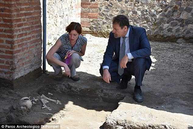 The crouching child is thought to have been trying to take shelter from the ensuing cataclysm when they were overwhelmed by deadly volcanic gases, experts say