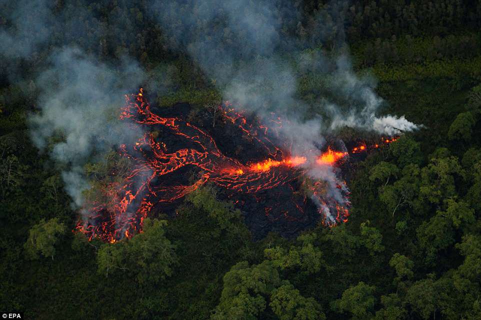 Volcanic activity continues, as a new fissure erupts in a field roughly 1/2 mile east of the Puna Geothermal Venture facility, Hawaii on Saturday