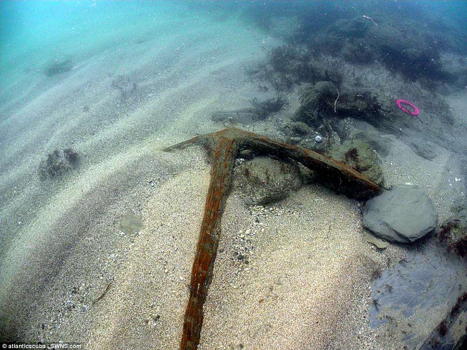 It is believed recent storms has shifted sands, revealing the loot to Cornwall Maritime Archaeology divers David Gibbins and Mark Milburn