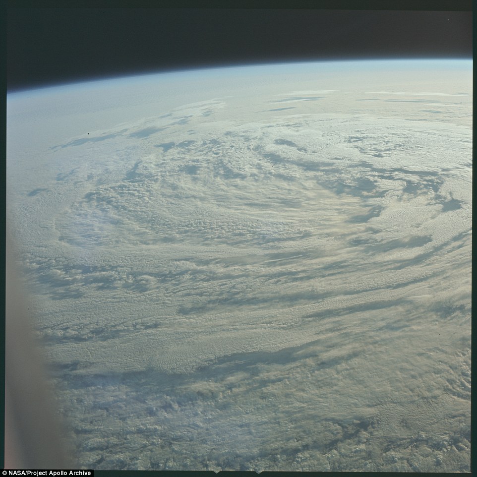 The Earth's atmosphere as seen on July 16, 1969. The swirling clouds are the tail end of Hurricane Bernice in the Pacific