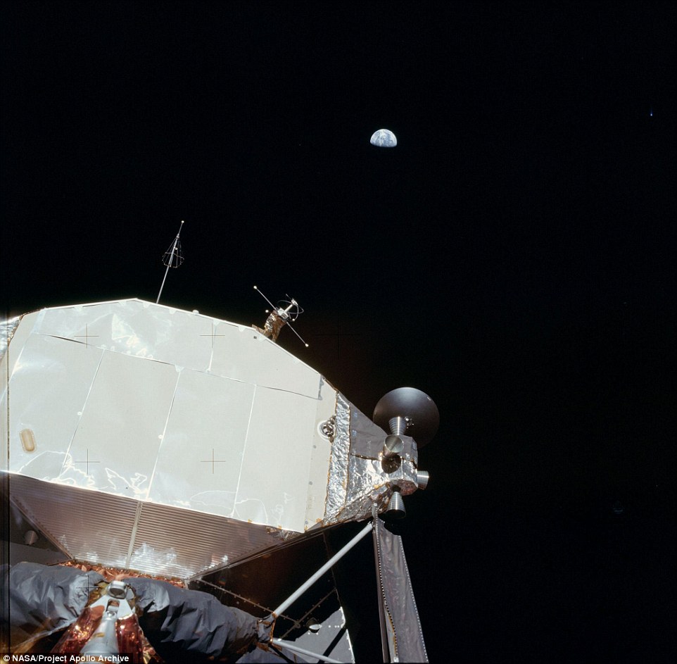 The Earth as seen more than 200,000 miles way from the Command Module heading towards the moon 