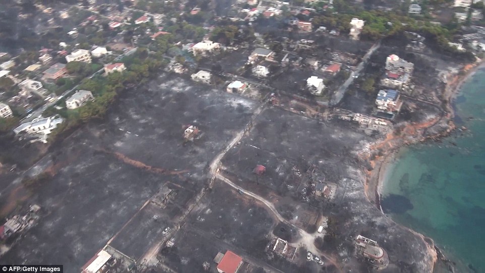 Dramatic aerial pictures show how fire devastated the village of Mati, leaving only scorched ground where houses once stood