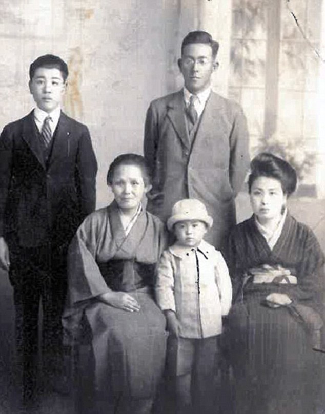 Chiyo Miyako is pictured far right with her family in the Kansai region of Japan 