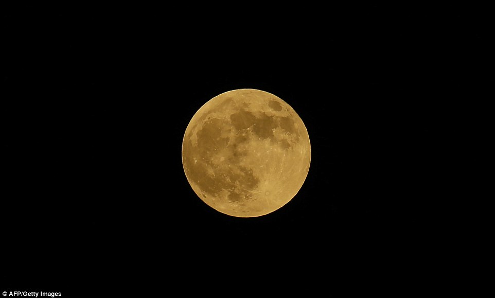 Gaza City: The 'Blood Moon' burned orange tonight as the longest lunar eclipse this century takes hold of the night sky 