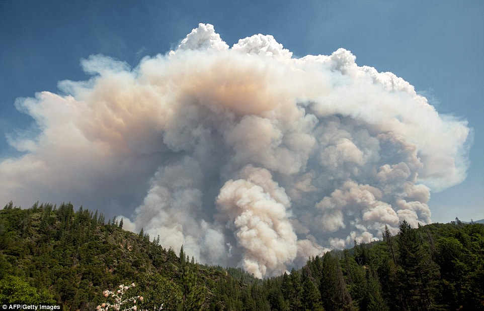 A large pyrocumulus cloud (or cloud of fire) explodes outward during the Carr fire near Redding on Friday, showing the vast extent of the blaze