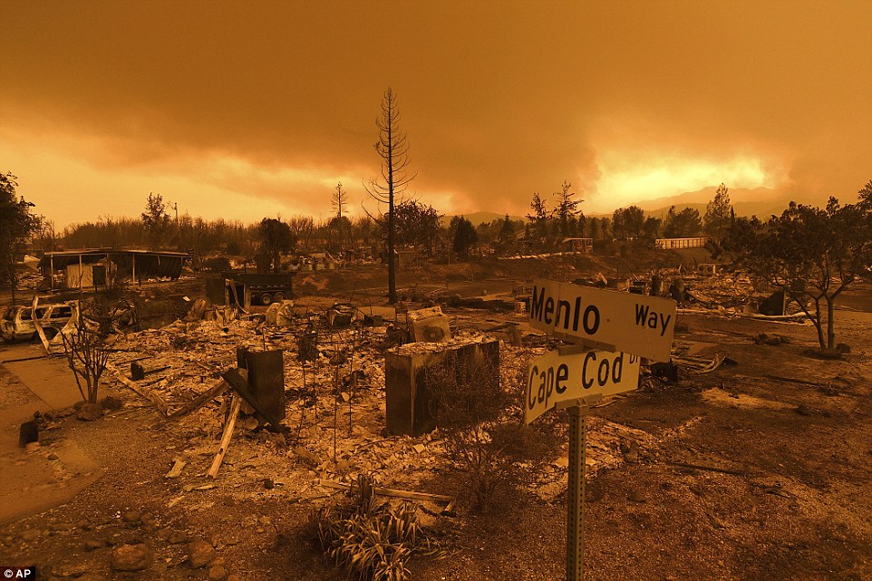 In the communities scorched by the blaze, such as Lake Keswick Estates in Redding (pictured), the Friday air was thick with the smell of smoke and chemicals, as the so-called Carr Fire continues to move through Shasta County like a freight train