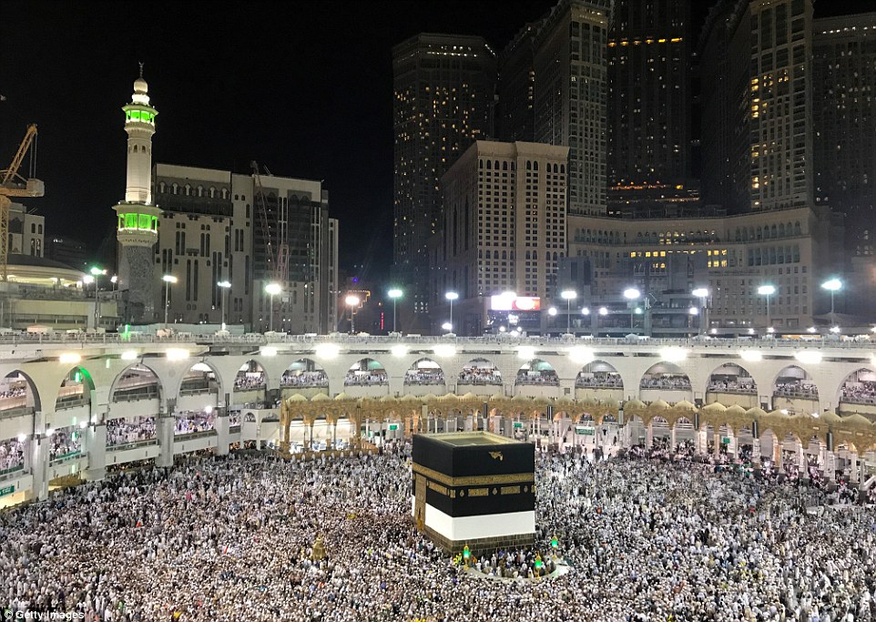 Muslim Hajj pilgrims perform morning prayer around the Kaaba, Islam's holiest site, located in the center of the Masjid al-Haram (Grand Mosque) in Mecca, Saudi Arabia