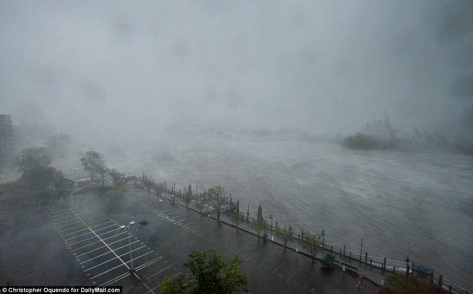 Florence's fiercest winds will linger around the coast for hours since the storm was moving forward at only 6 mph. Pictured: The hurricane arriving at Wilmington on Friday