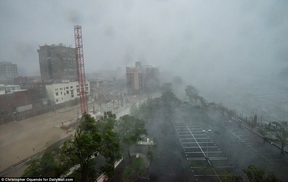 Wind-whipped waves lash the coast at Wilmington, North Carolina, on Friday. Nearly all residents had evacuated following warnings from officials