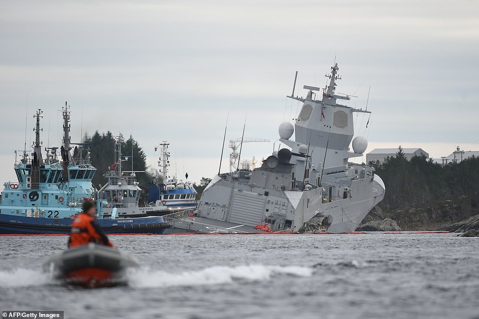 5956492-6366613-eight_sailors_were_injured_after_the_warship_one_of_the_largest_-a-24_1541720330045 Eight sailors were injured after the warship, one of the largest in the Norwegian navy, collided with the oil tanker