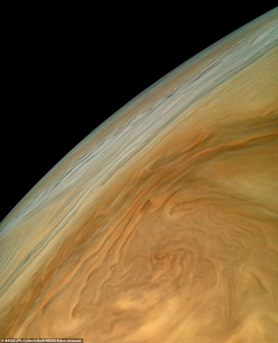 7256876-6481141-image-a-35_1544479681555 A stunning image captured by NASA's Juno spacecraft revealed a fresh look at the whirlpool of clouds high above Jupiter. The spacecraft completed its 16th close flyby of the giant planet this past October, revealing some of our best glimpses yet at its fascinating atmospheric processes