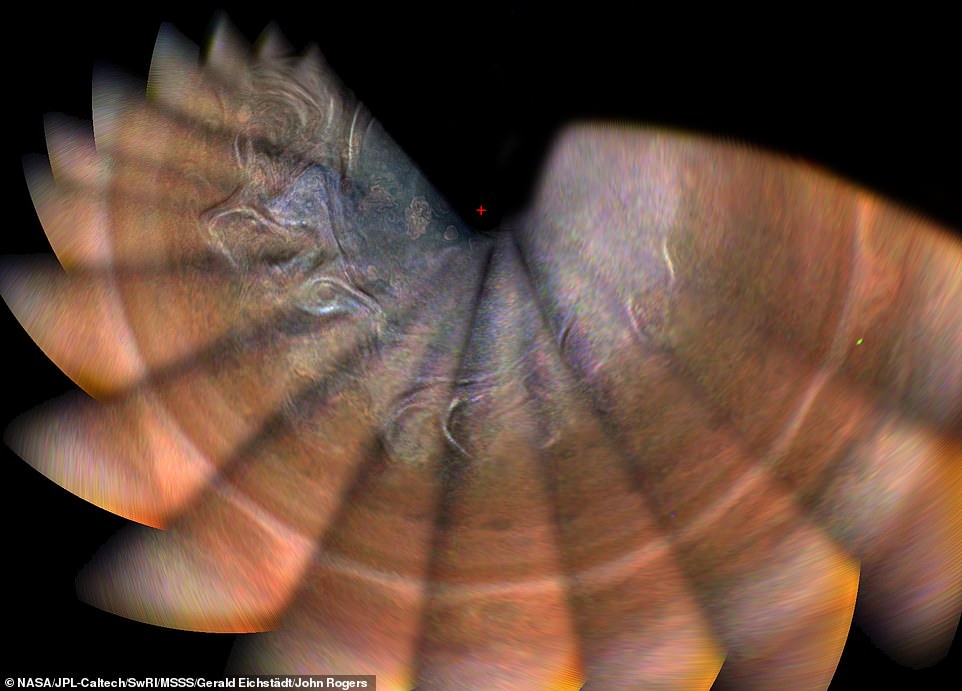 7387230-6492387-image-a-22_1544717392356 The craft's science instruments probe beneath the planet's obscuring cloud cover and study Jupiter's aurora, helping us to understand the planet's origins, interior structure, atmosphere and magnetosphere. This mosaic combines colour-enhanced images taken over Jupiter's north pole when the lighting was excellent for detecting high bands of haze