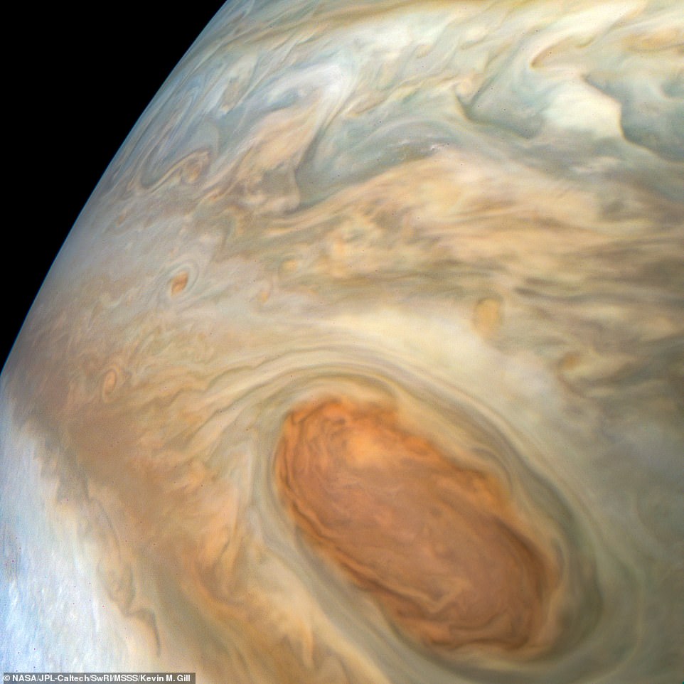 7387232-6492387-image-a-23_1544717406078 Juno is in a highly-elliptical 53-day orbit around the planet and has given us our best glimpse yet of Jupiter's fascinating atmospheric processes. Detailed structure in the clouds of Jupiter's South Equatorial Belt brown barge is visible in this colour-enhanced image