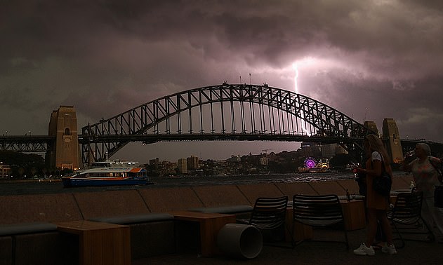 7413728-6495975-wild_storms_are_ravaging_sydney_pictured_as_experts_warn_people_-a-1_1544829918394 Forecaster Mr Wilke said 'The two systems are interacting giving a lot of humidity and moisture in eastern New South Wales which explains the mugginess in Sydney'