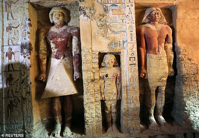 7474100-6498949-image-a-234_1544915272923 The 33 ft (ten metres) long, 9.8 ft (three metres) wide tomb has just under three metres high walls which are decorated with hieroglyphs and statues of pharaohs